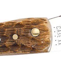 Case 00245 Sod Buster Jr. Plain Peach Seed Jigged Amber Bone Handle